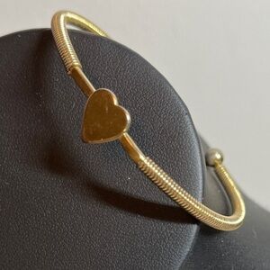 Vintage Gold Tone Heart Cuff Bracelet signed by Sarah Coventry. For small wrist